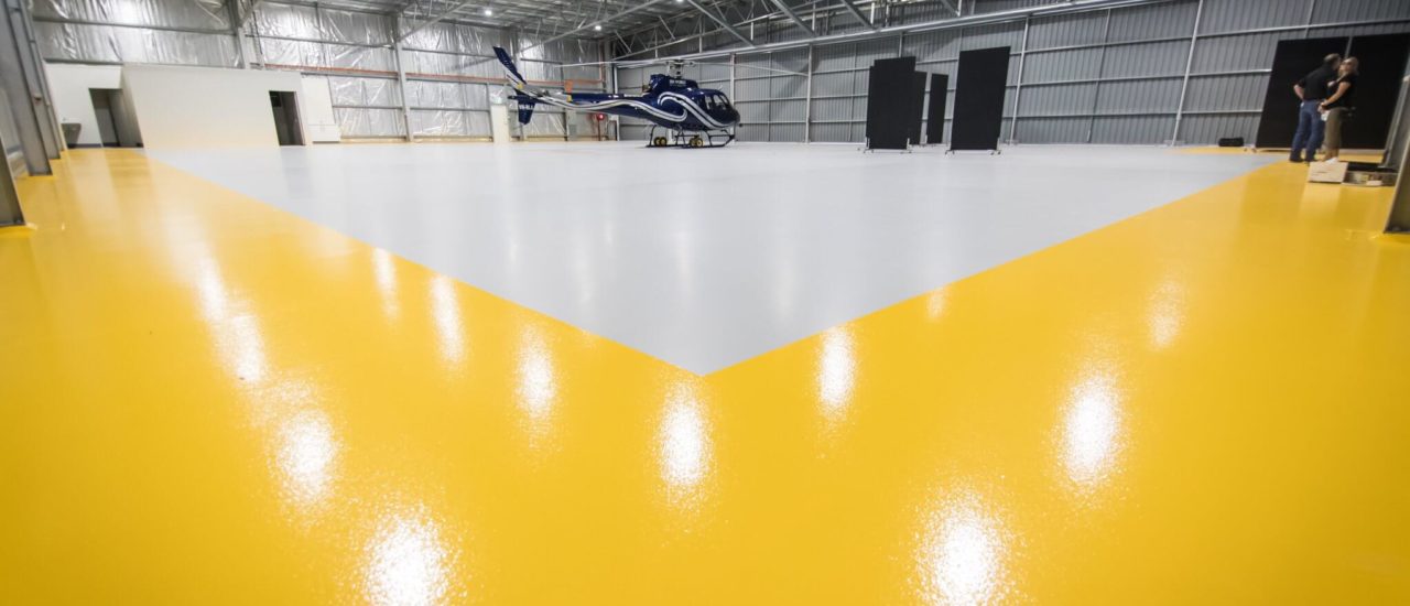 HELICOPTER HANGAR WITH SAFETY YELLOW PERIMETER